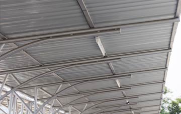 installing Trims Green metal roofing